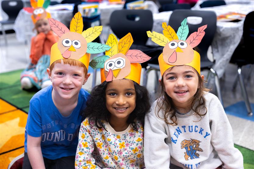 Creekside kindergartners and their families enjoy breakfast
